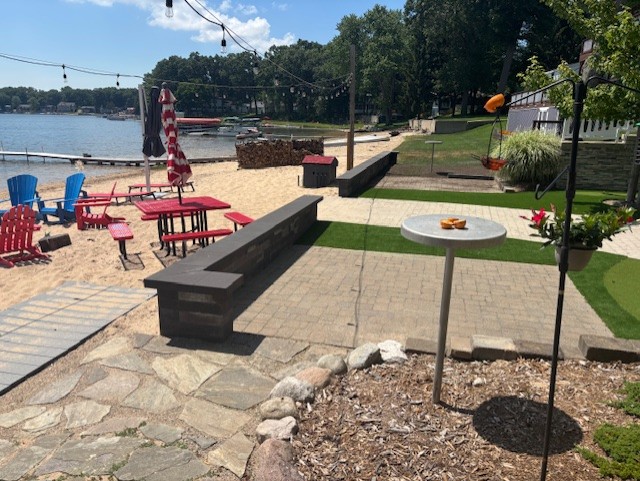 Sand Trap Solution and Stylish New Putting Green - After photo of knee wall barrier